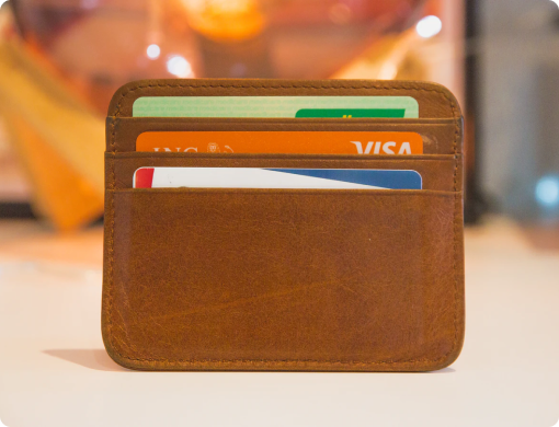 a wallet with credit cards visible